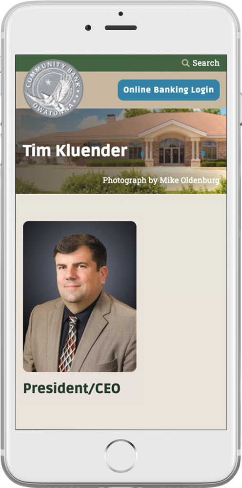Community Bank Owatonna’s responsive bank website on a smartphone
