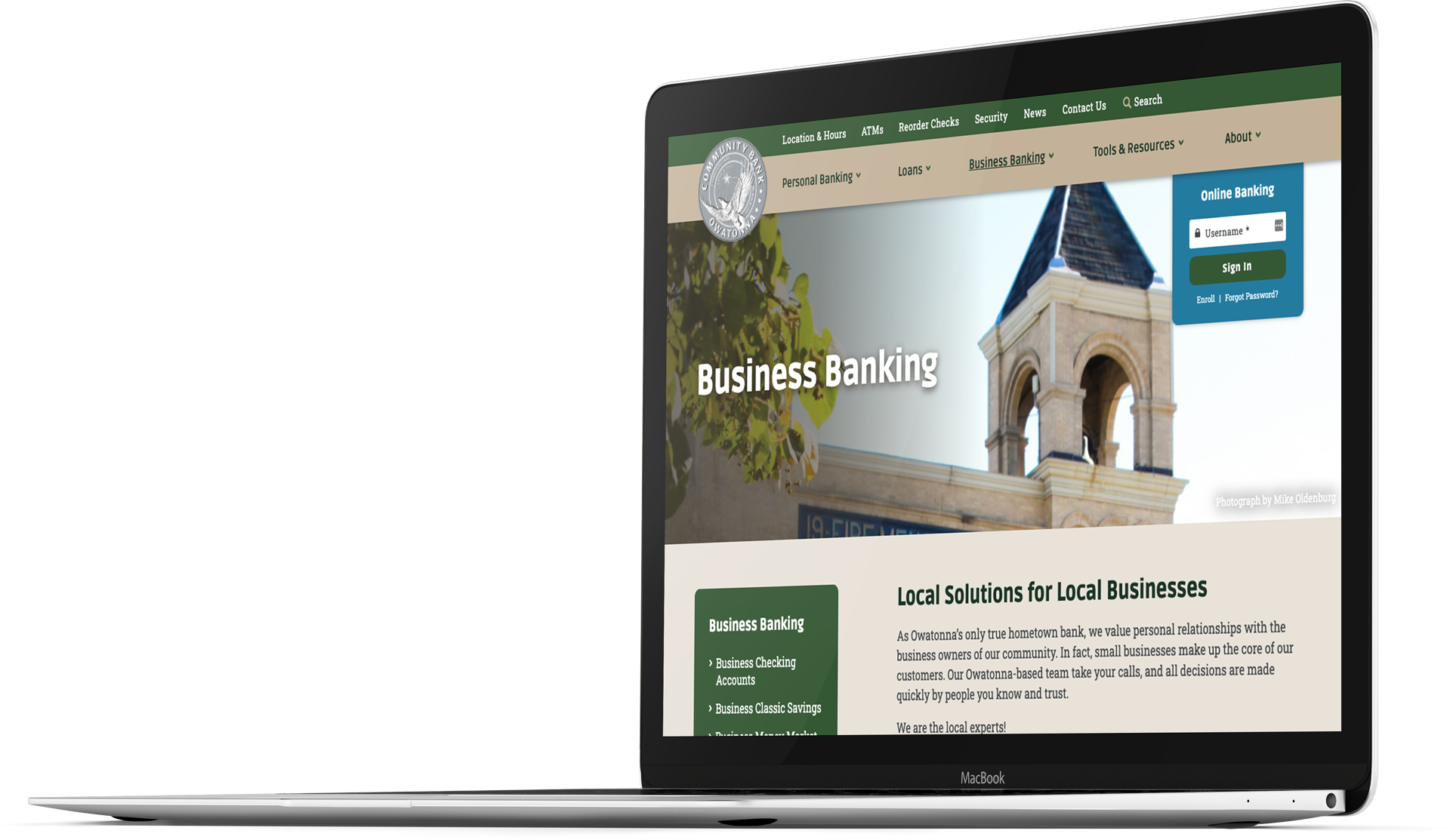 Bank website design for Community Bank Owatonna on a laptop screen